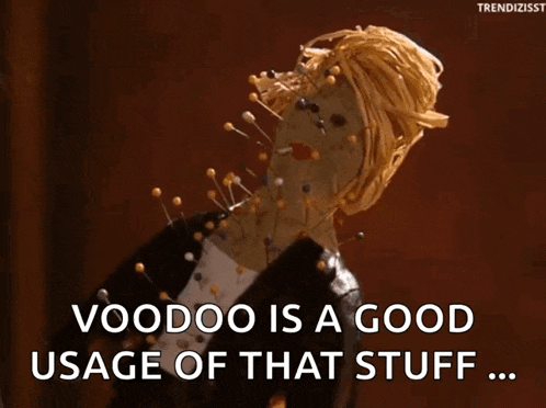 a doll is pinned to a wall and says " voodoo is a good usage of that stuff "