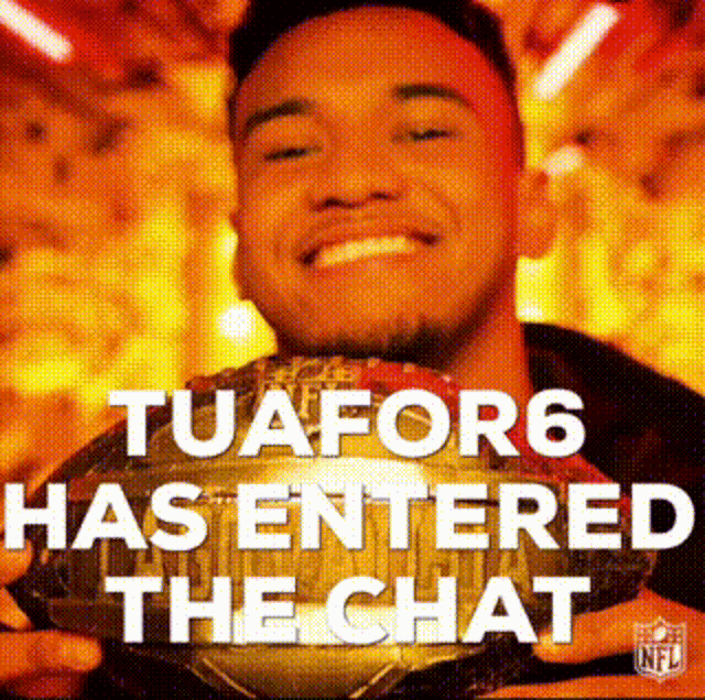 a man is smiling and holding a trophy with the words tuafor6 has entered the chat
