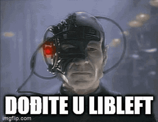 a man wearing a robotic helmet with the words dobite u libleft written on it .