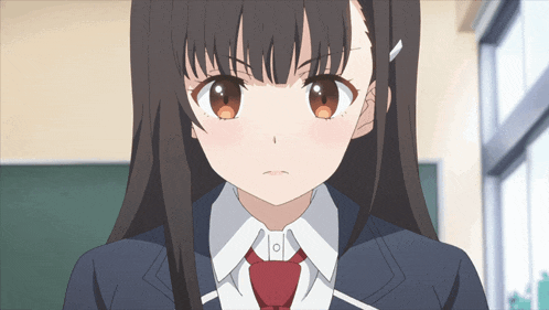 a girl in a school uniform has a red tie