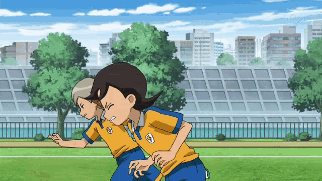 a couple of cartoon characters with the letter c on their shirts