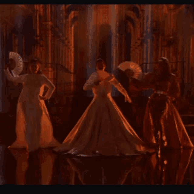 a painting of a group of people dancing in a room