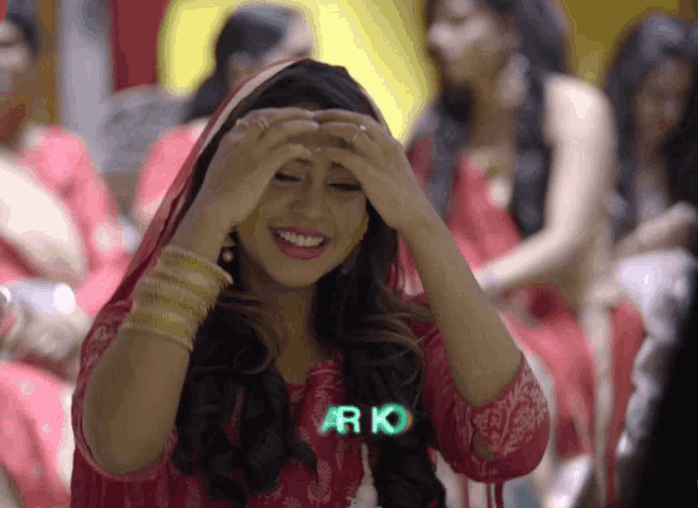 a woman in a red dress with the word rk on her chest