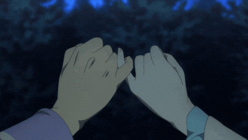 a couple of people holding hands with a dark background