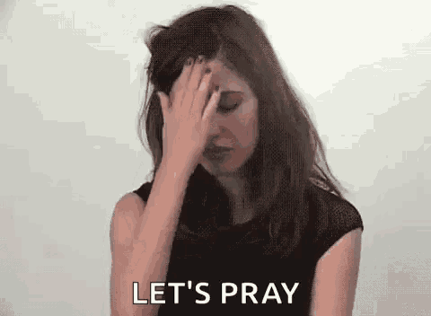 a woman is covering her face with her hand and says let 's pray .