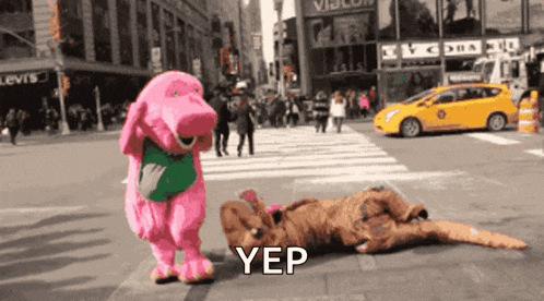a person in a dinosaur costume is laying on the ground and the word yep is on the ground