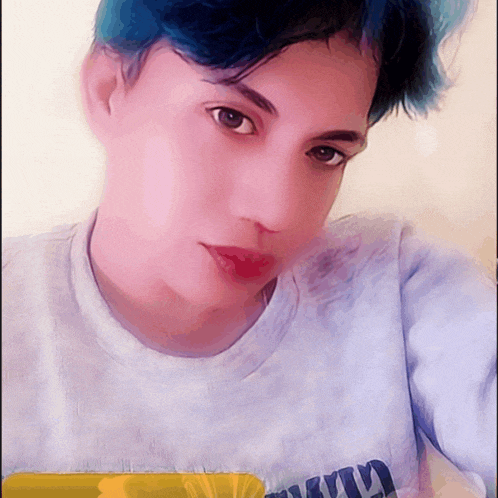 a girl with blue hair is wearing a shirt that says ' u.s.a. ' on it