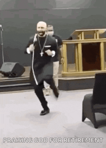 a man in a robe is dancing in a church .
