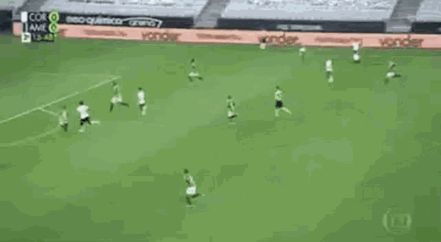 a soccer game is being played on a field with advertisements for continental