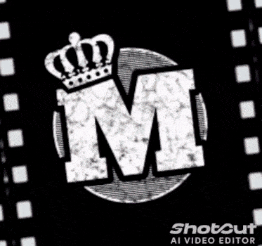 the letter m with a crown on top of it