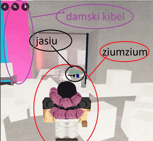 a person standing in a room with a sign that says damski kibel on it