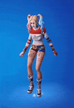 a woman in a harley quinn costume is dancing on a blue background