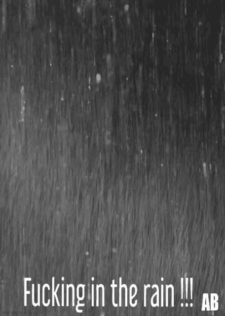 a black and white photo of rain with the words " fucking in the rain "