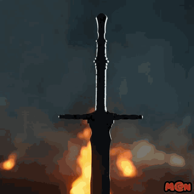 a picture of a sword in front of a fire with the letters mcn on the bottom right