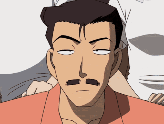 a man with a mustache is making a funny face with his eyes closed