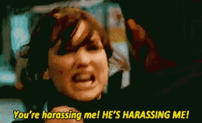 a woman is screaming and saying `` you 're harassing me ! he 's harassing me ! ``