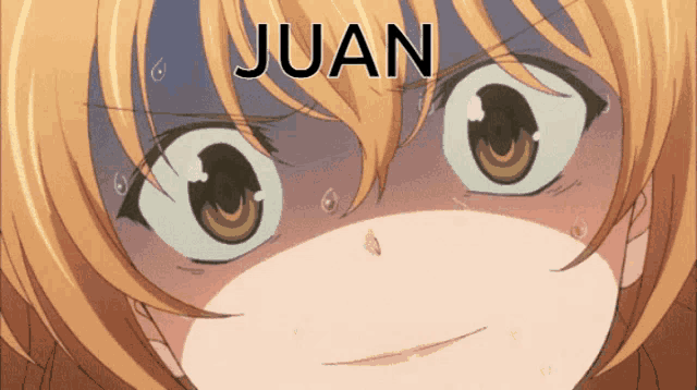 a close up of a girl 's face with the name juan written on it