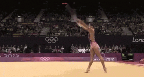 Rhythmic Gymnastics With A Hula Hoop GIF - Rhythmic Gymnastics Gymnastic Hula Hoop GIFs