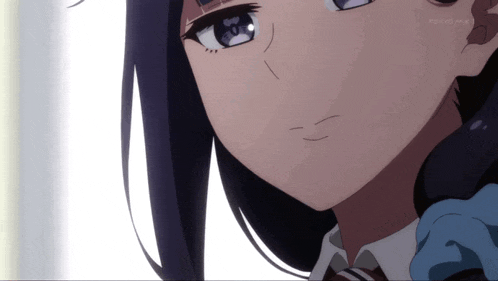 a close up of a girl 's face with tokyo mx written on the bottom right