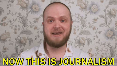 a bald man with a beard and a white shirt says now this is journalism