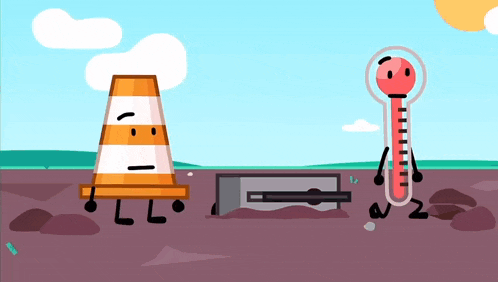 a traffic cone and a thermometer are standing next to each other