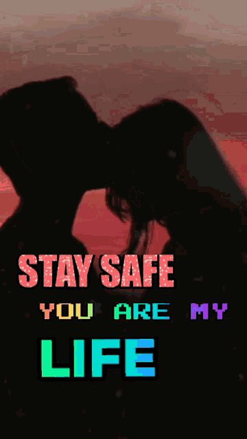 a man and a woman kissing with the words stay safe you are my life