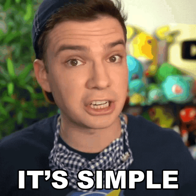 a man says it 's simple in front of a bunch of toys