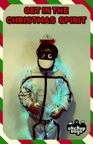 a poster that says get in the christmas spirit with a person in a mask