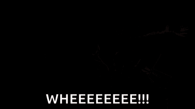 a man is sticking his head out of a car window while driving down a street ..