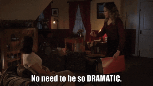 two women sitting on a couch with the words " no need to be so dramatic "
