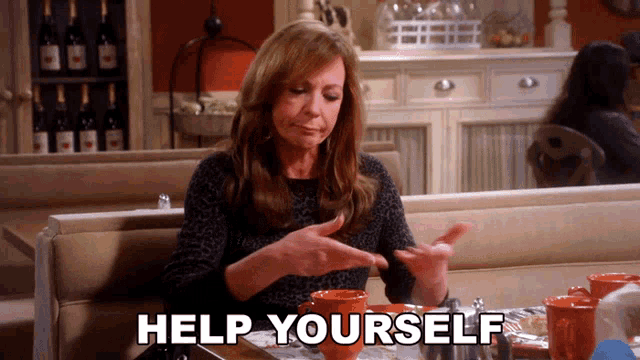 a woman sitting at a table with help yourself written on the bottom right