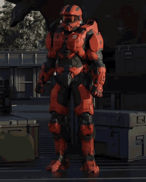a man in a red and black armor with the number 238 on his helmet