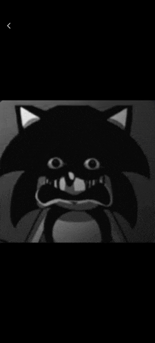 a black and white photo of a cartoon character with a big mouth and big eyes .