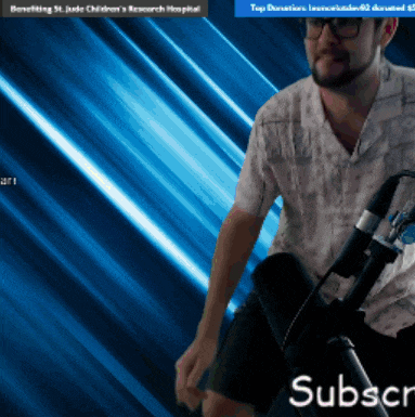 a man is holding a microphone in front of a blue background that says ' subscr ' on it