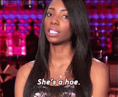 a woman is saying she 's a hoe in a bar
