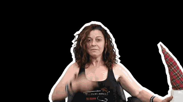 a woman in a black tank top that says staff on it