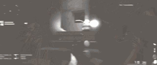 a close up of a red object with a yellow light in the middle