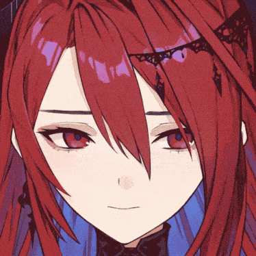 a close up of a girl 's face with long red hair