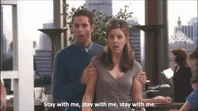 a man and a woman are standing next to each other and the woman says " stay with me stay with me stay with me "