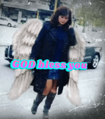 a woman with angel wings and the words god bless you behind her