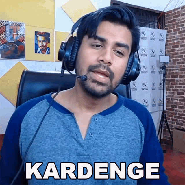 a man wearing headphones says kardenge in a video