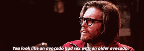 a man wearing glasses and a red shirt says you look like an avocado had sex with an older avocado