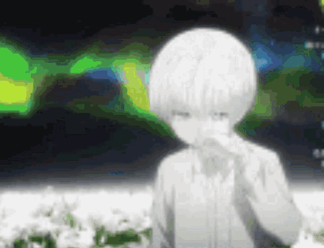 a blurred image of a child with white hair
