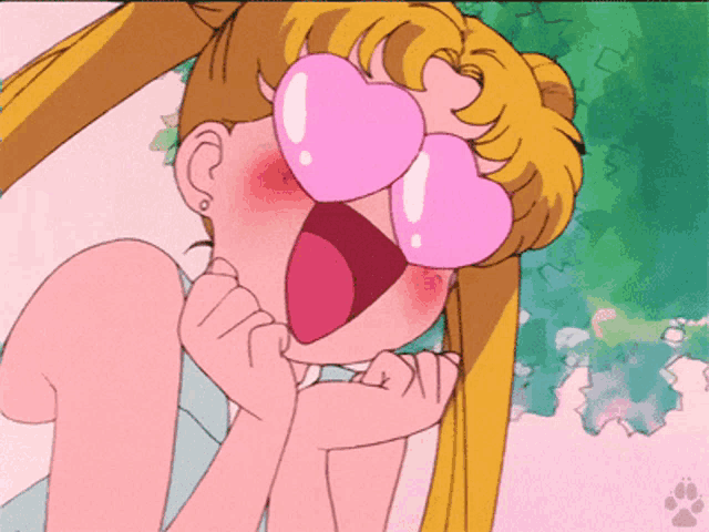 a girl wearing a pair of heart shaped glasses