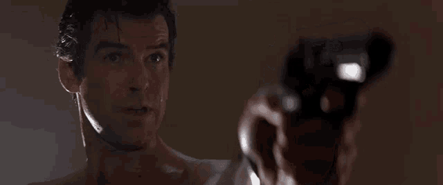 a shirtless man holding a gun with the words no more foreplay written below him