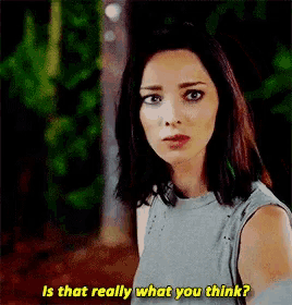 a woman in a blue shirt is talking to someone and says `` is that really what you think ? ''