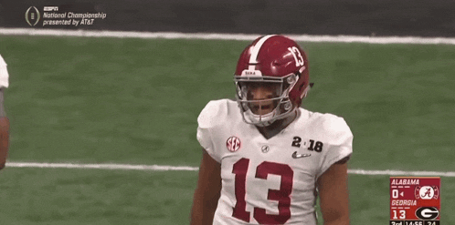a football player with the number 13 on his shirt