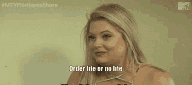 a woman is talking about life and no life .