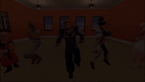 a group of people are dancing in a dark room with orange walls .