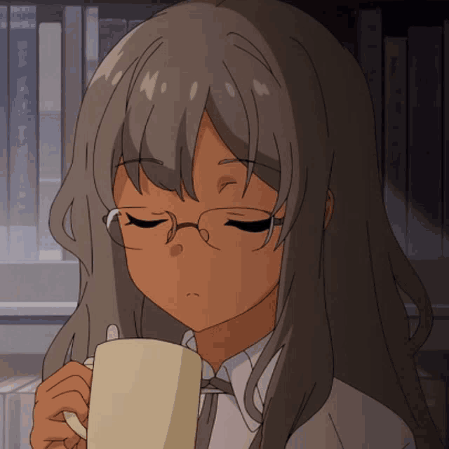 a girl with glasses is drinking from a cup with her eyes closed
